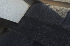 Brand new houses have issues too. This fascia board's cut edge is in contact with roofing and will suffer moisture damage over time.